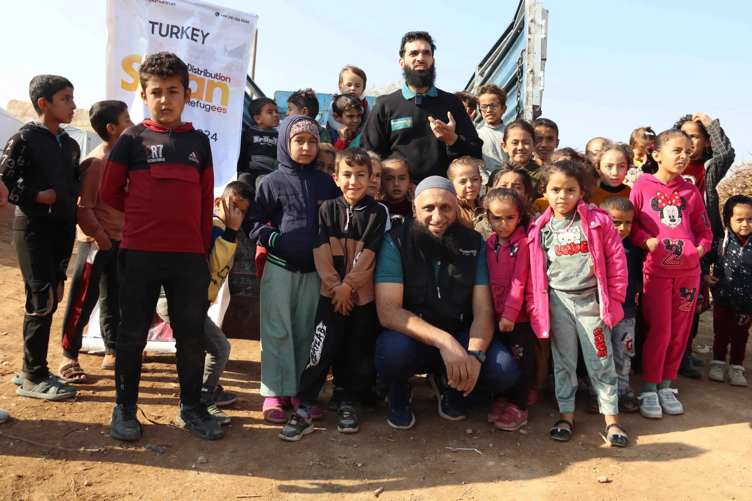 Volunteers with children